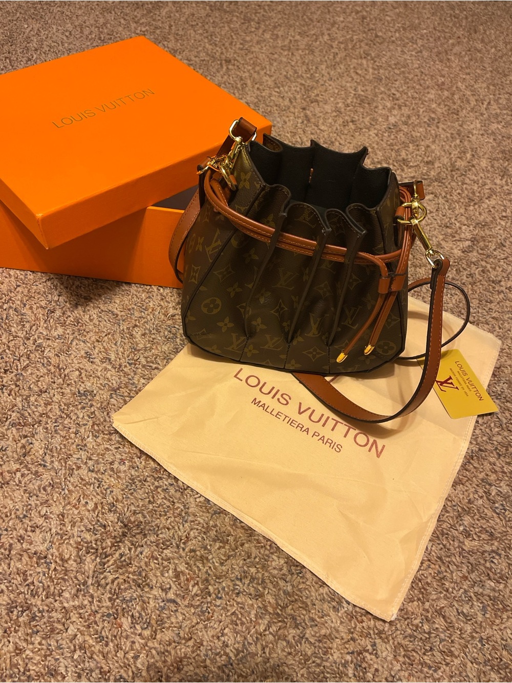 Louis Vuitton Monogram Mini Drawstring Bag in Brown and Tan with Gold Hardware